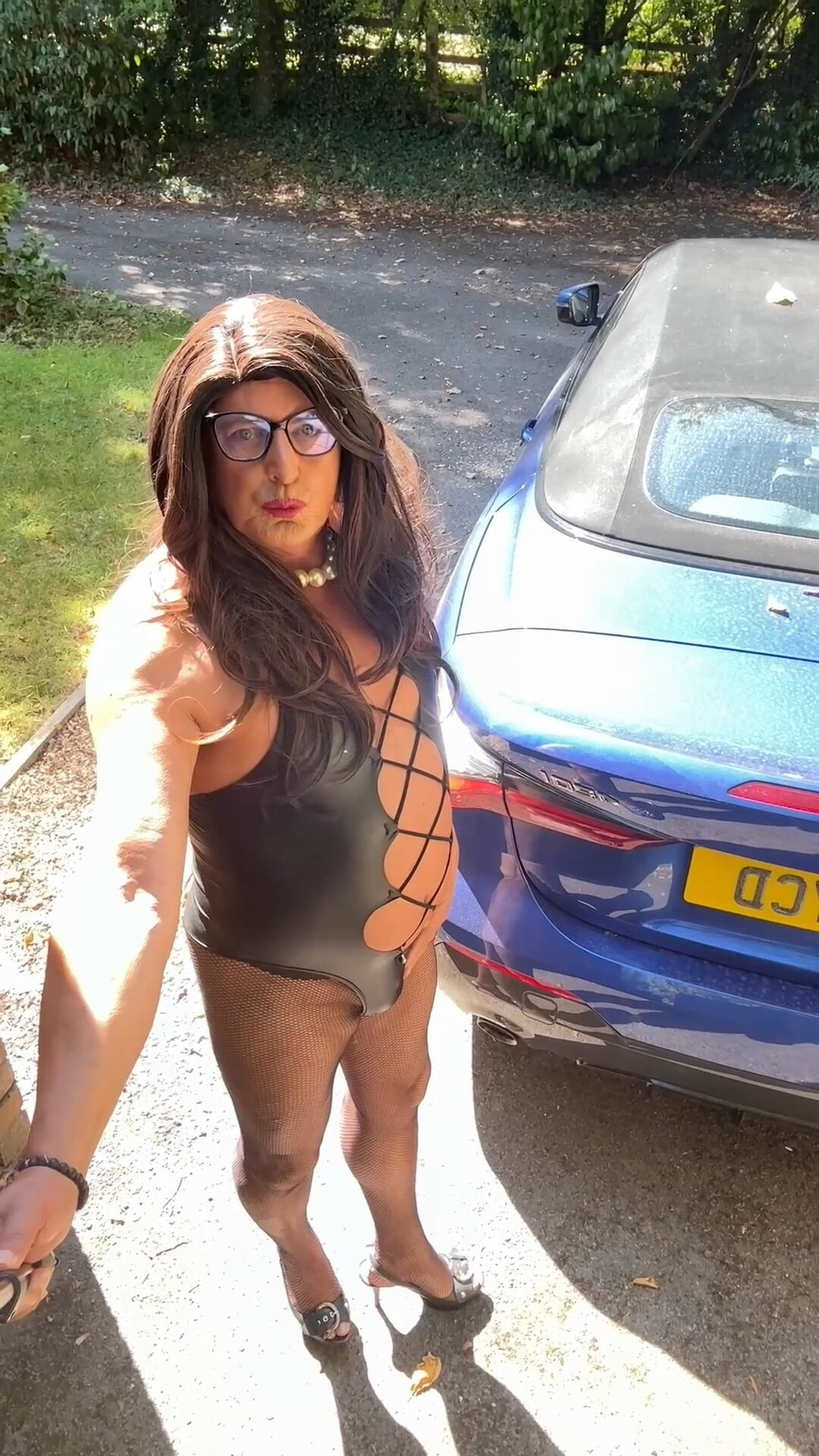 Sexy Crossdresser kellycd2022 in black pvc bodysuit and heel #33