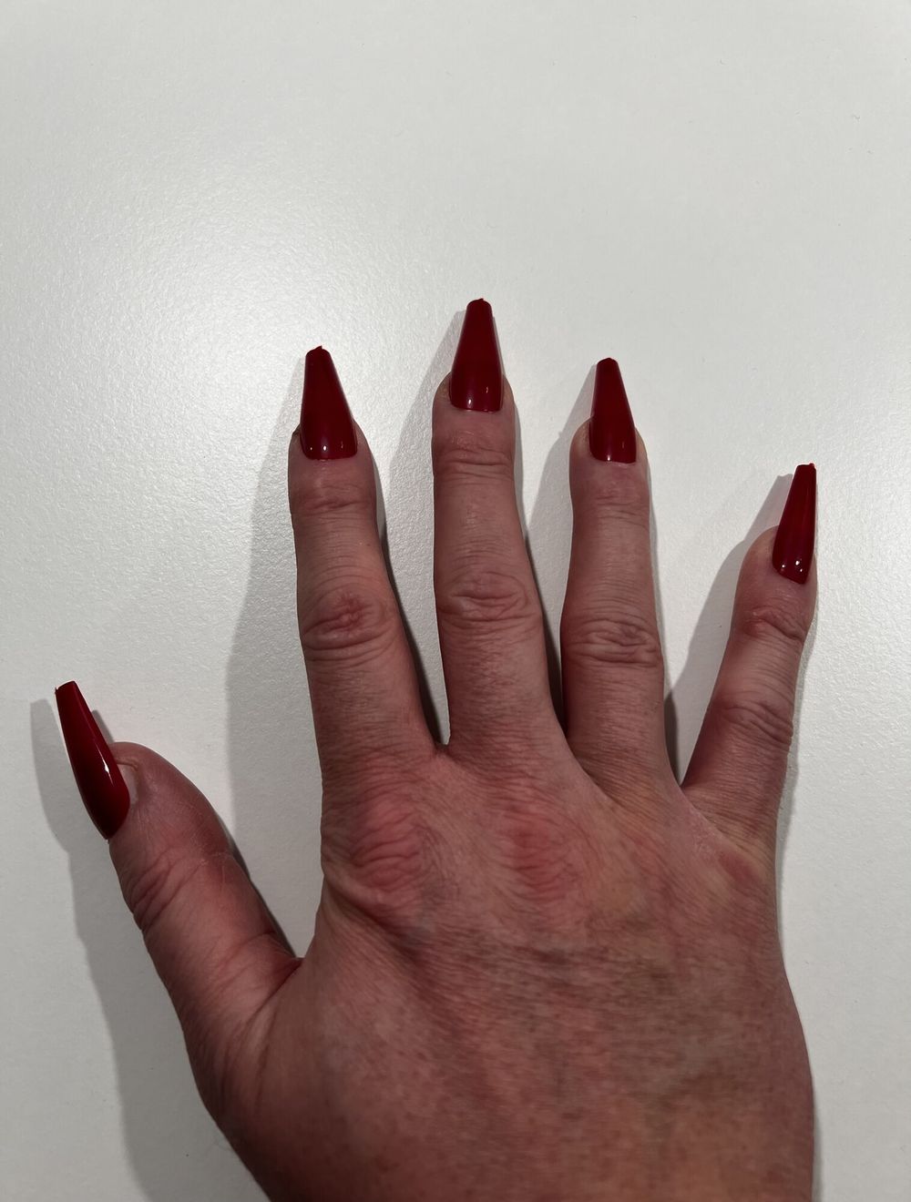 Ready to give a handjob with my new red nails.  #2