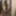 Tanned girl posing nude in the mirror