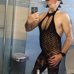 Black catsuit and dildo