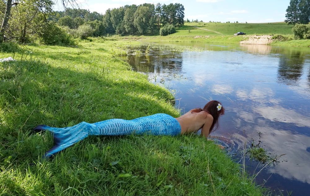 Mermaid plays with water #57