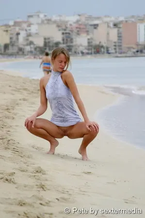 german amateur petty shows naked pussy on the beach         