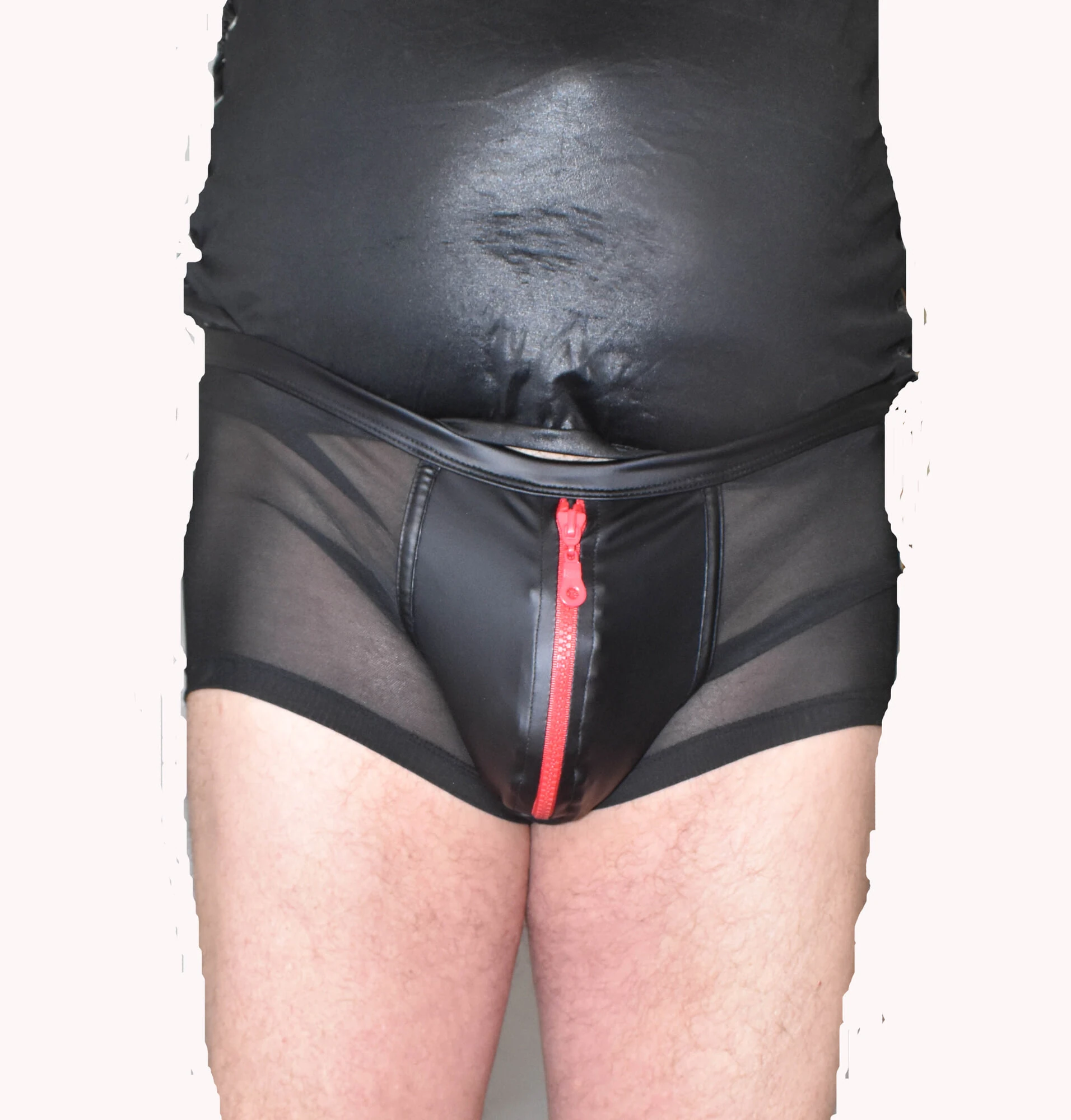 DRESSED IN A TIGHT NYLON SHORTS.