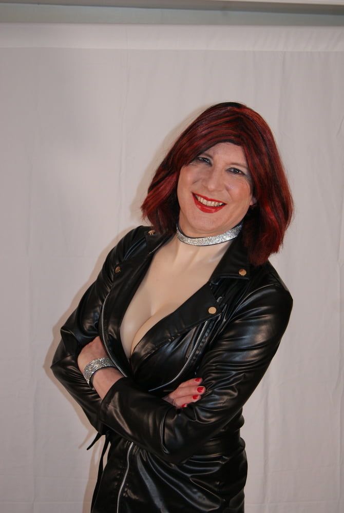 TGirl Lucy being Dom in leather look dress and big tits #46
