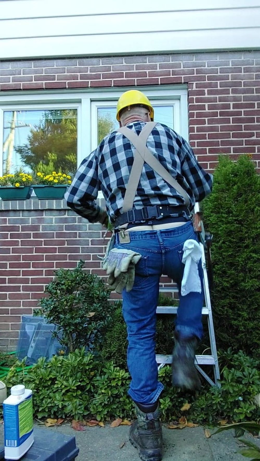 Construction dad inspecting windows #3