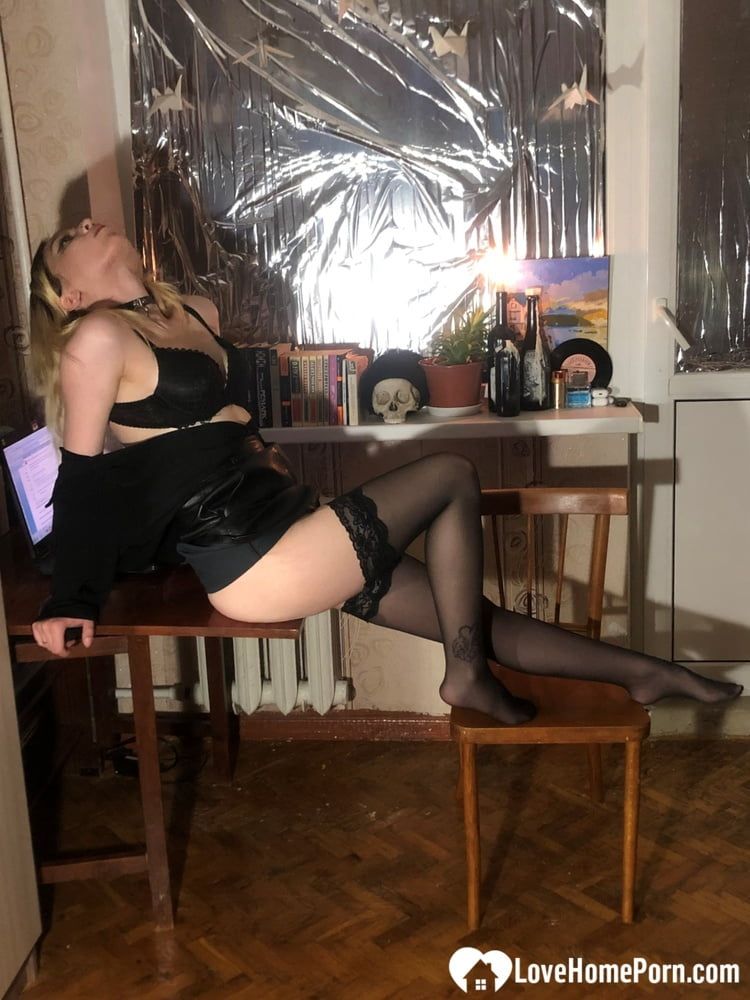 Hot blonde in stockings strips her lingerie #17
