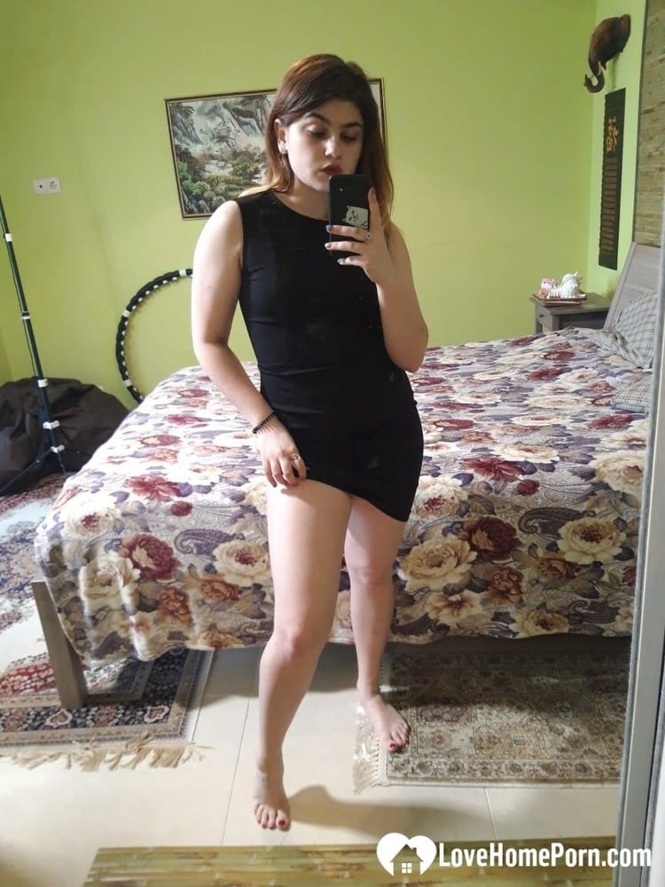 Naughty brunette strips off her black dress #14