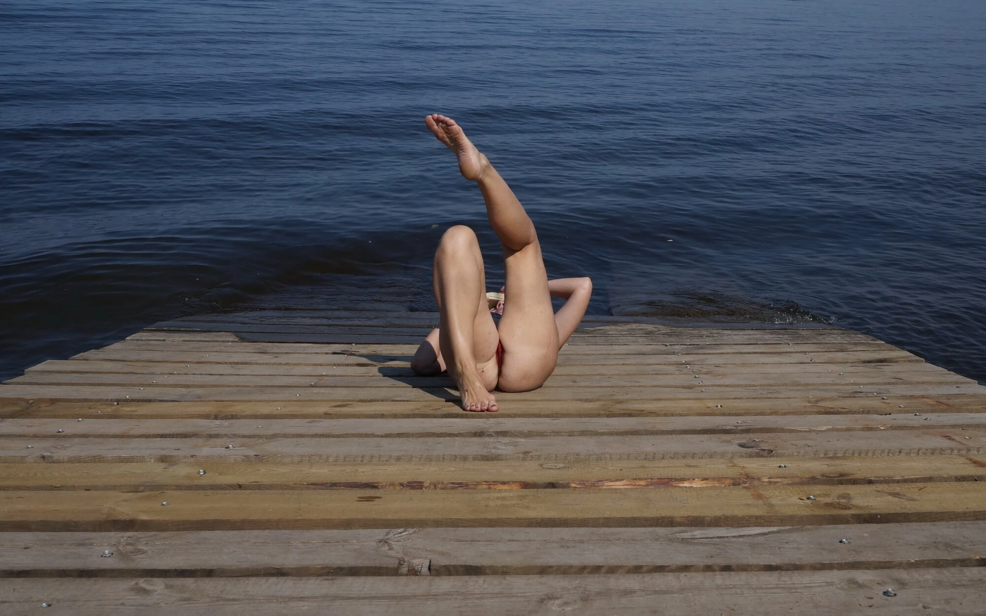 Legs play on a wooden platform #10