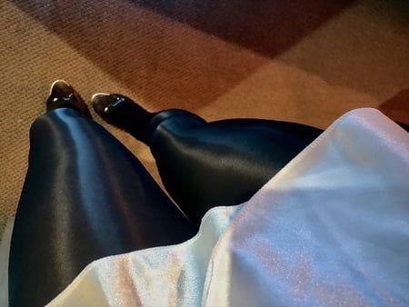 Moments of shiny legs, glossy tights and high heels,