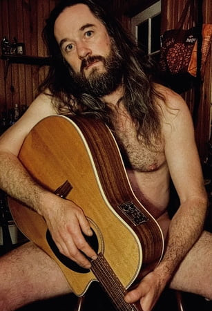 Sexy musiker med gitar 