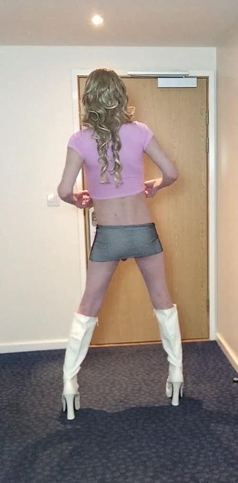 Sissy Sandra in pink top posing #5