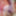 Lying back in red open crotch fishnets with dildo in rubbing