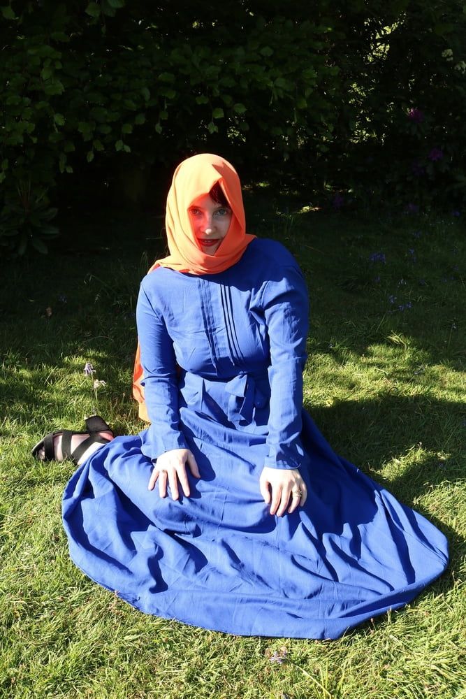 hijab and abaya flashing outdoors #12
