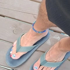 My feet in flip flop sandals