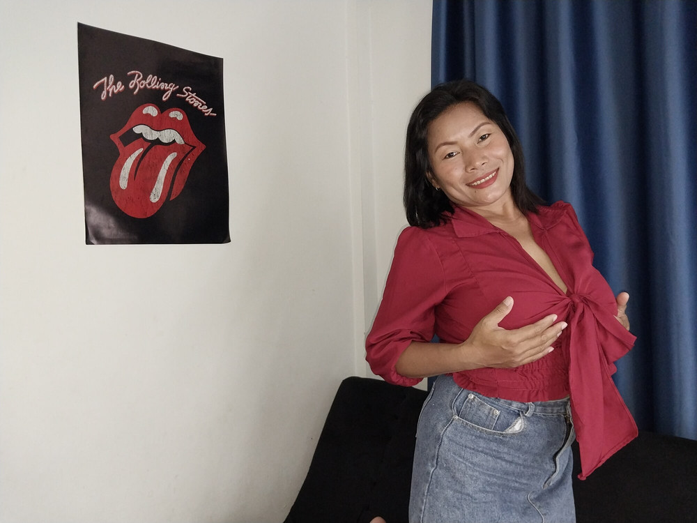 Thaiger on the Sofa in a Mini Skirt and a Red Top #11