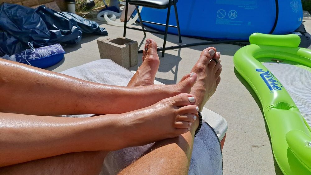 Tanning our legs and feet #10