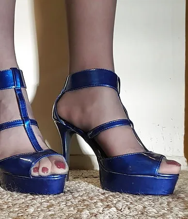 pantyhose and shiny blue heels        