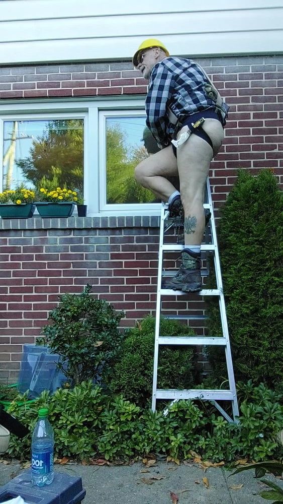 Construction dad inspecting windows #5