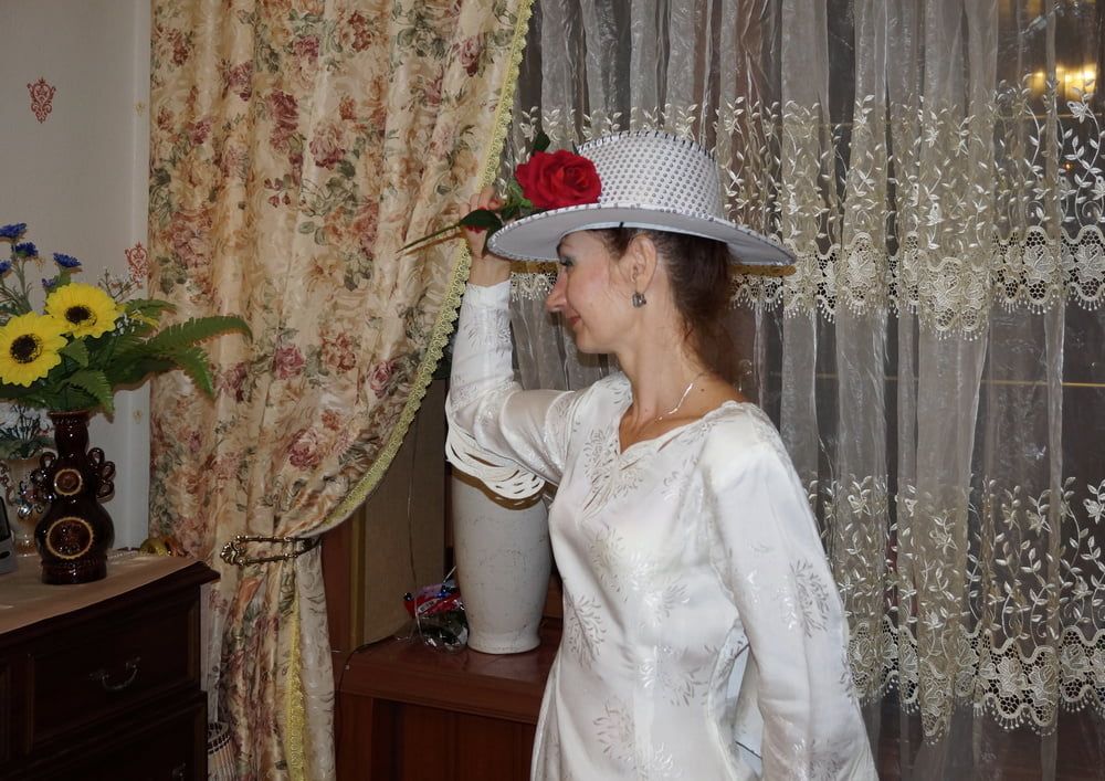 In Wedding Dress and White Hat #9