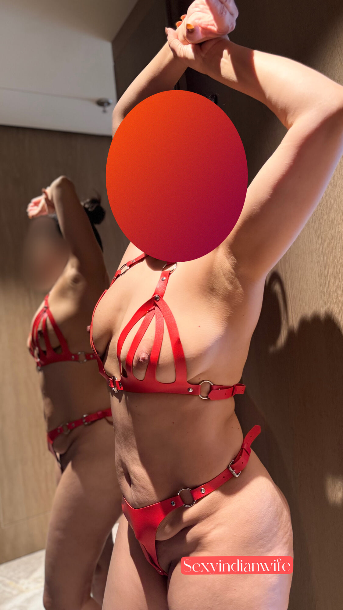 Dasi wife in red leather dress 