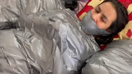   mummified girls barefoot in duct tape bondage         