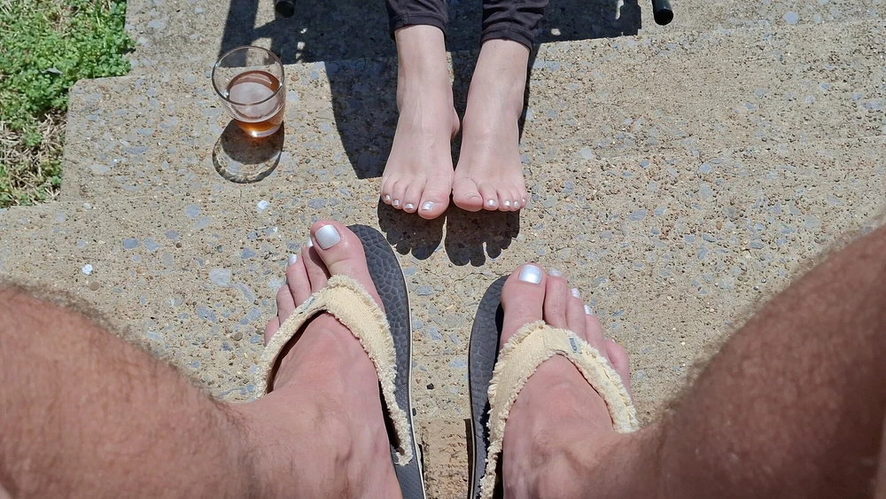 Relaxing outside showing our pedicured and painted toes #22