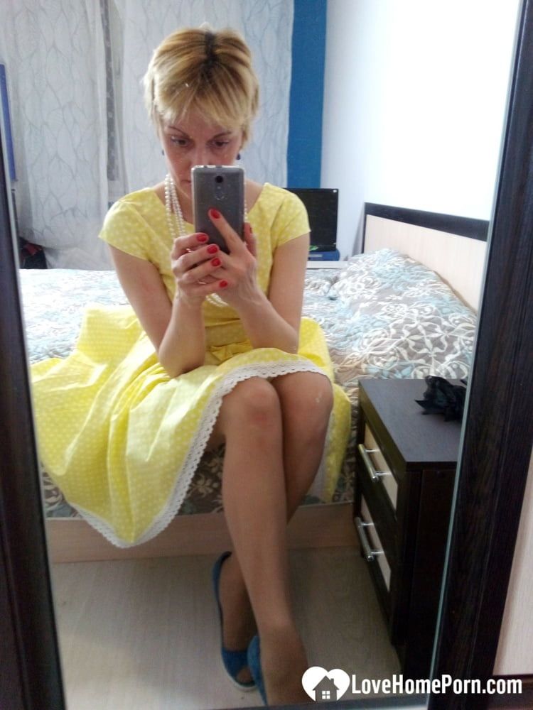 Stunning MILF puts on a yellow dress #28