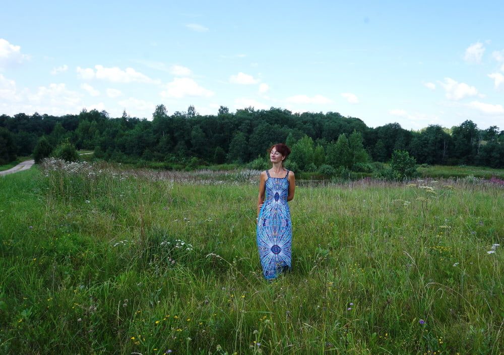 In blue dress in field #44
