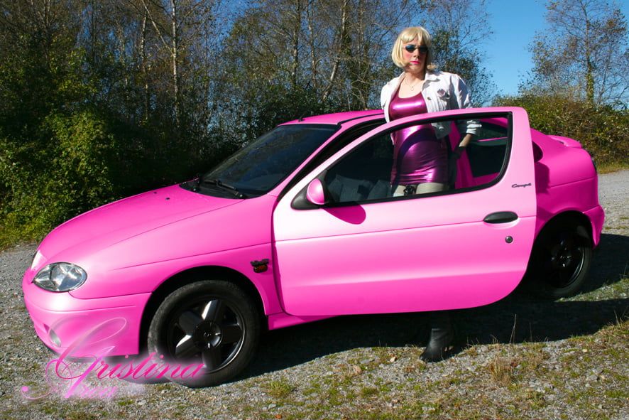 Slutty sissy in a photoshoot with her car... #22