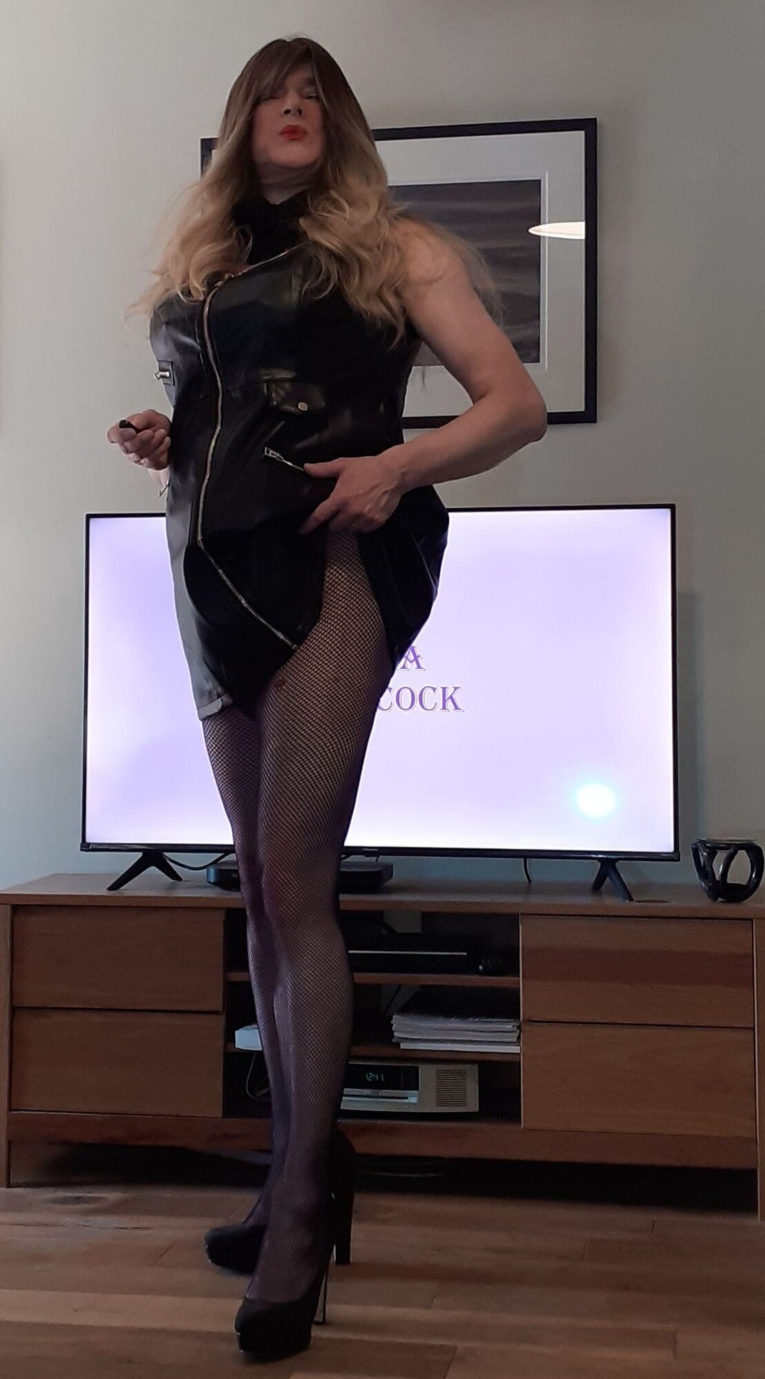 crossdressed in black leather dress #9
