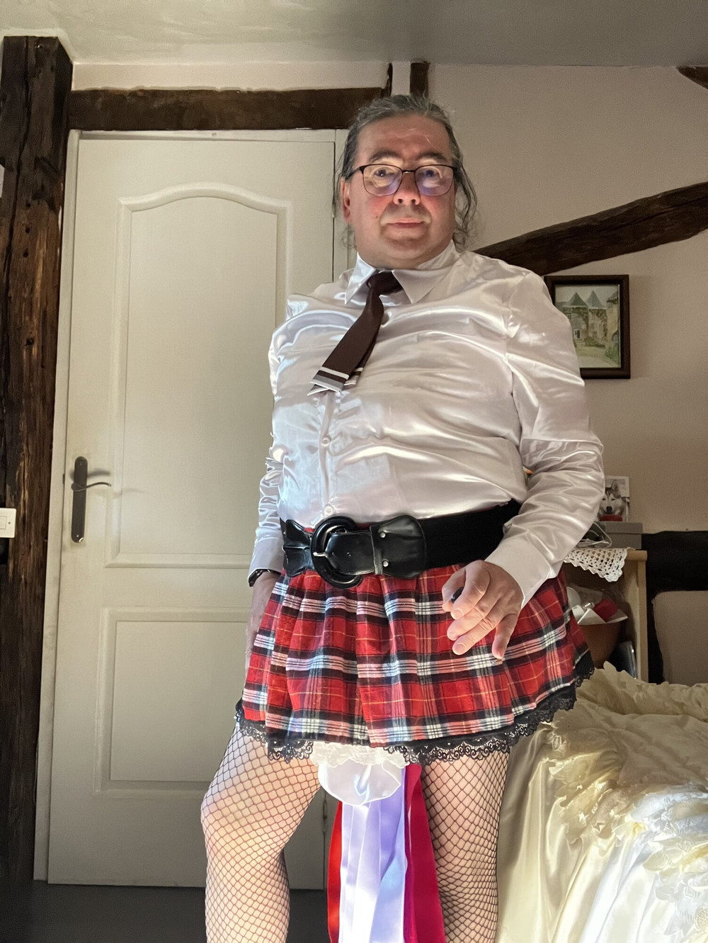 In an outfit with a little red and black skirt #6