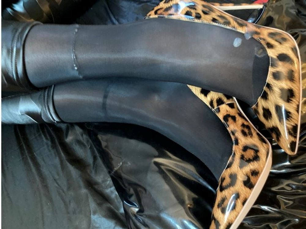 Black Leggings and Animal Print High Heels #21