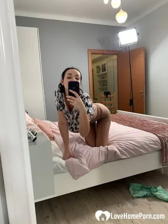 Hot teacher taking some selfies in her room