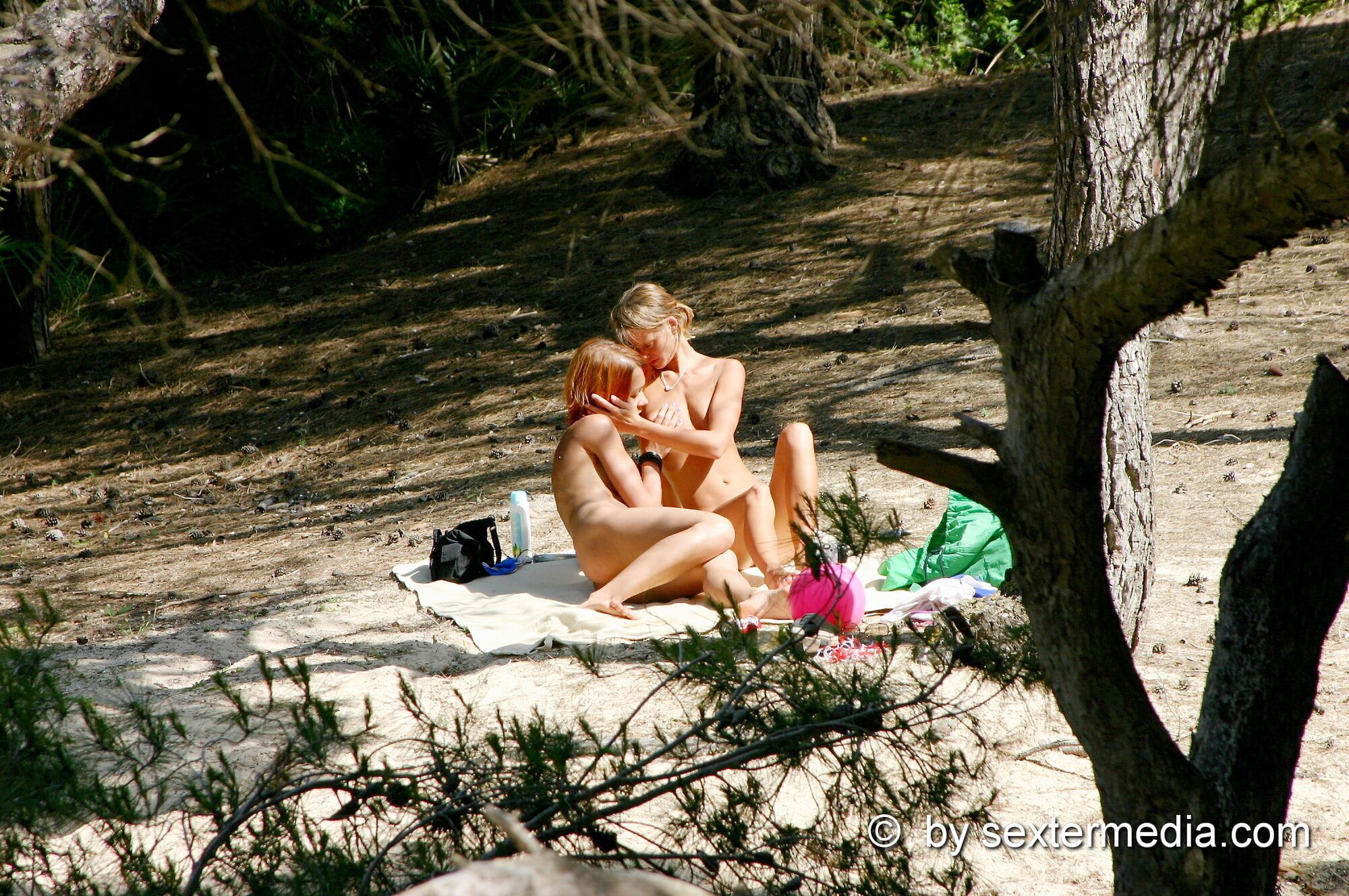 Girls lesbian games on the beach in Mallorca