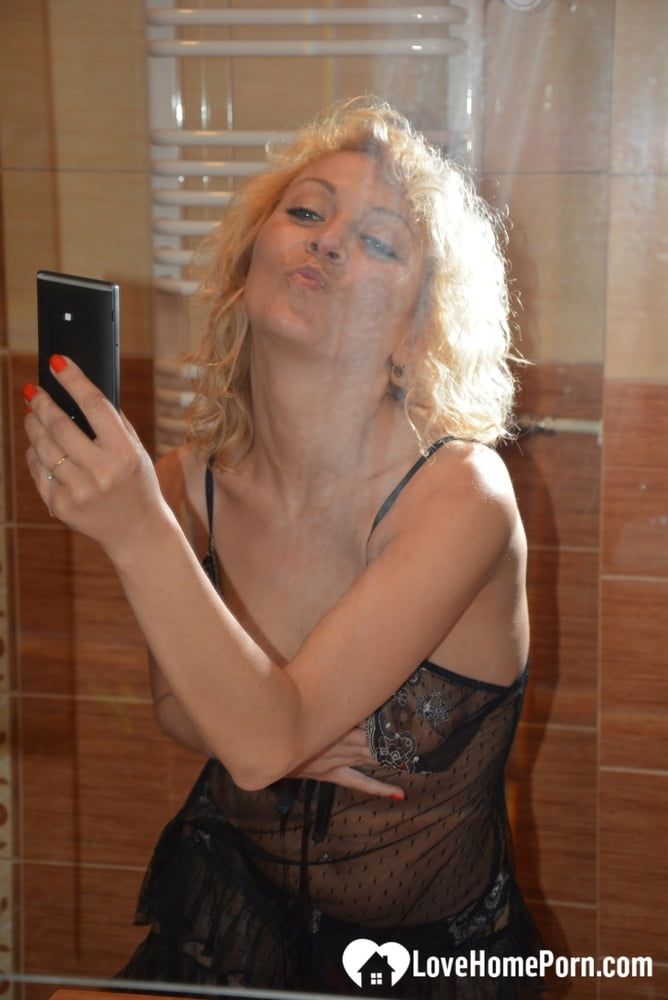 Hungarian sweetie teasing in her black lingerie #2