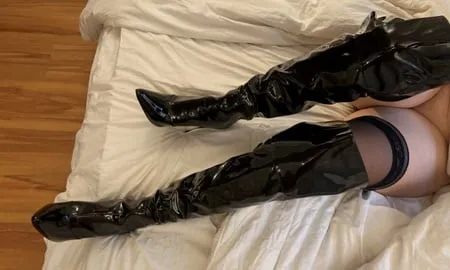 thigh high black high heel boots         