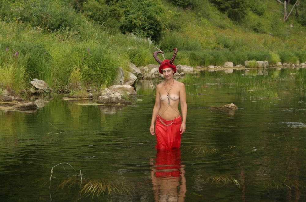 With Horns In Red Dress In Shallow River #17
