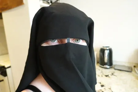 pregnant wife in muslim niqab and nursing bra         