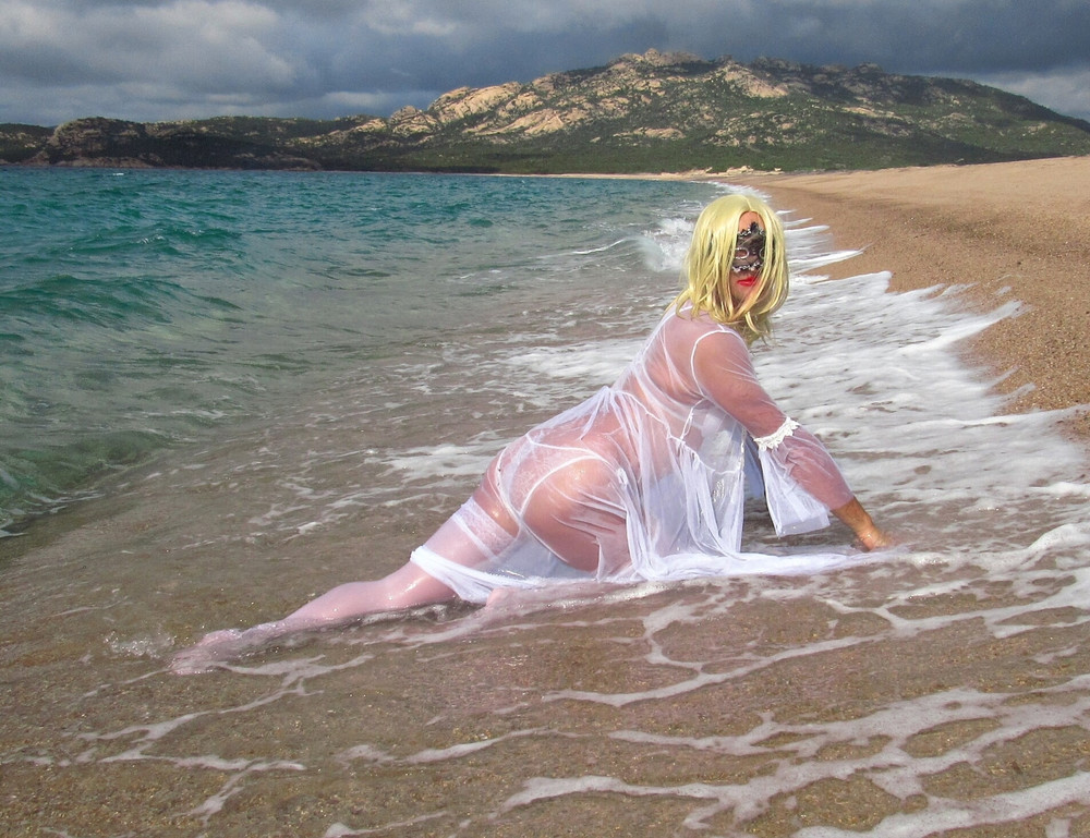 Sexy MILF Blonde shows off her ass on the beach. #39