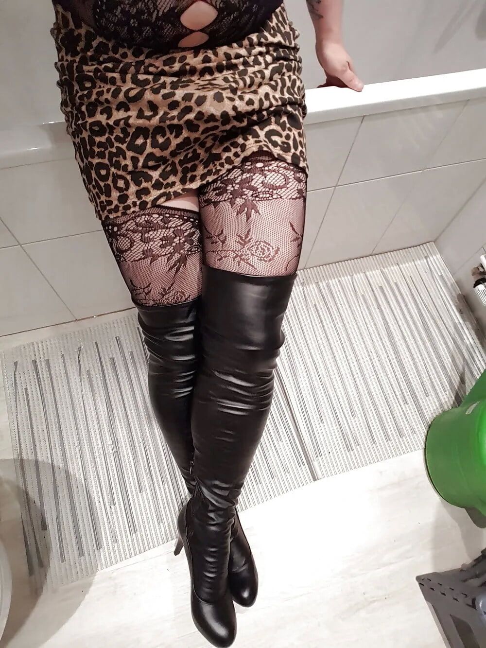 Lepard outfit with black boots and lingerie