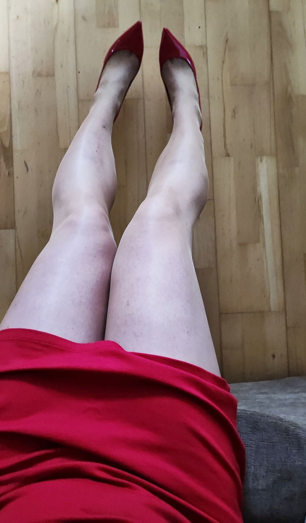 Red dress and nude pantyhose