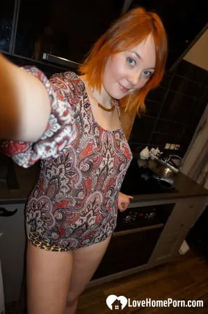 hot redhead knows how to tease on camera         