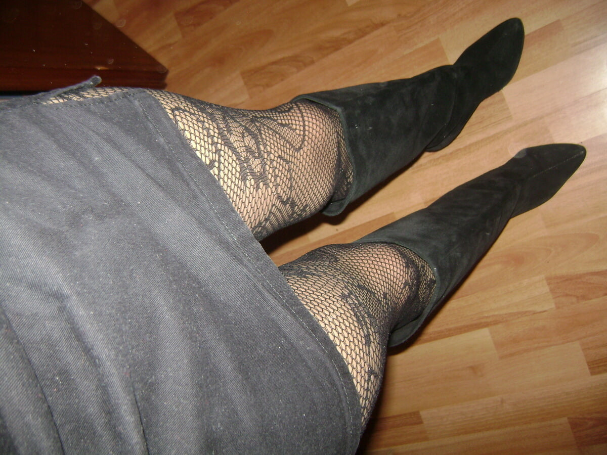 Trying on various miniskirts, with patterned tights