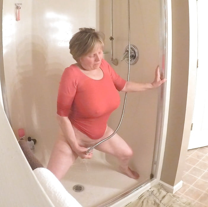 GILF masturbates in wet t-shirt #13