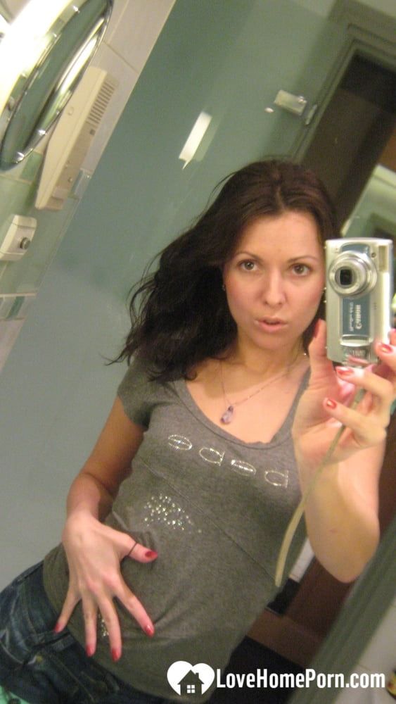 Innocent brunette teasing in her own bathroom #3