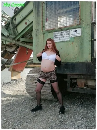 posing with excavator         