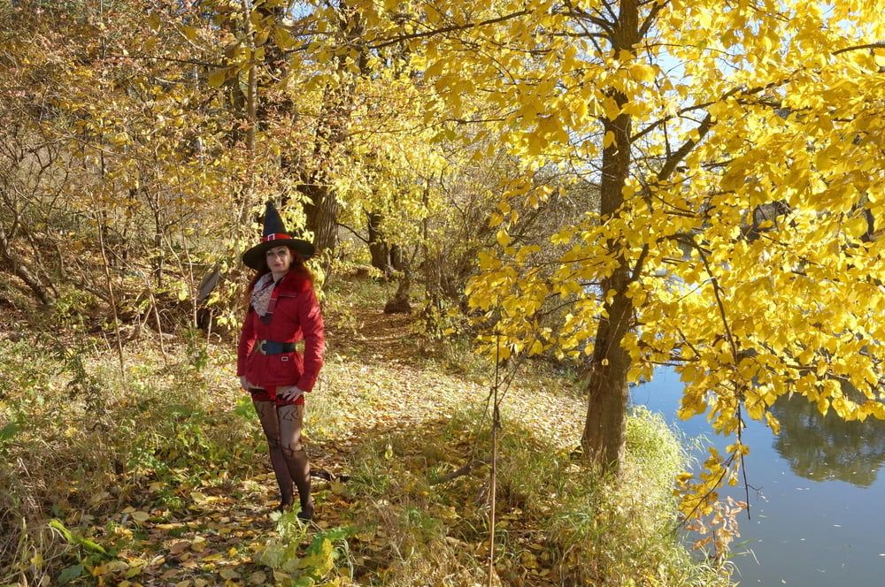 In Hat on Yellow Leaves Background #18