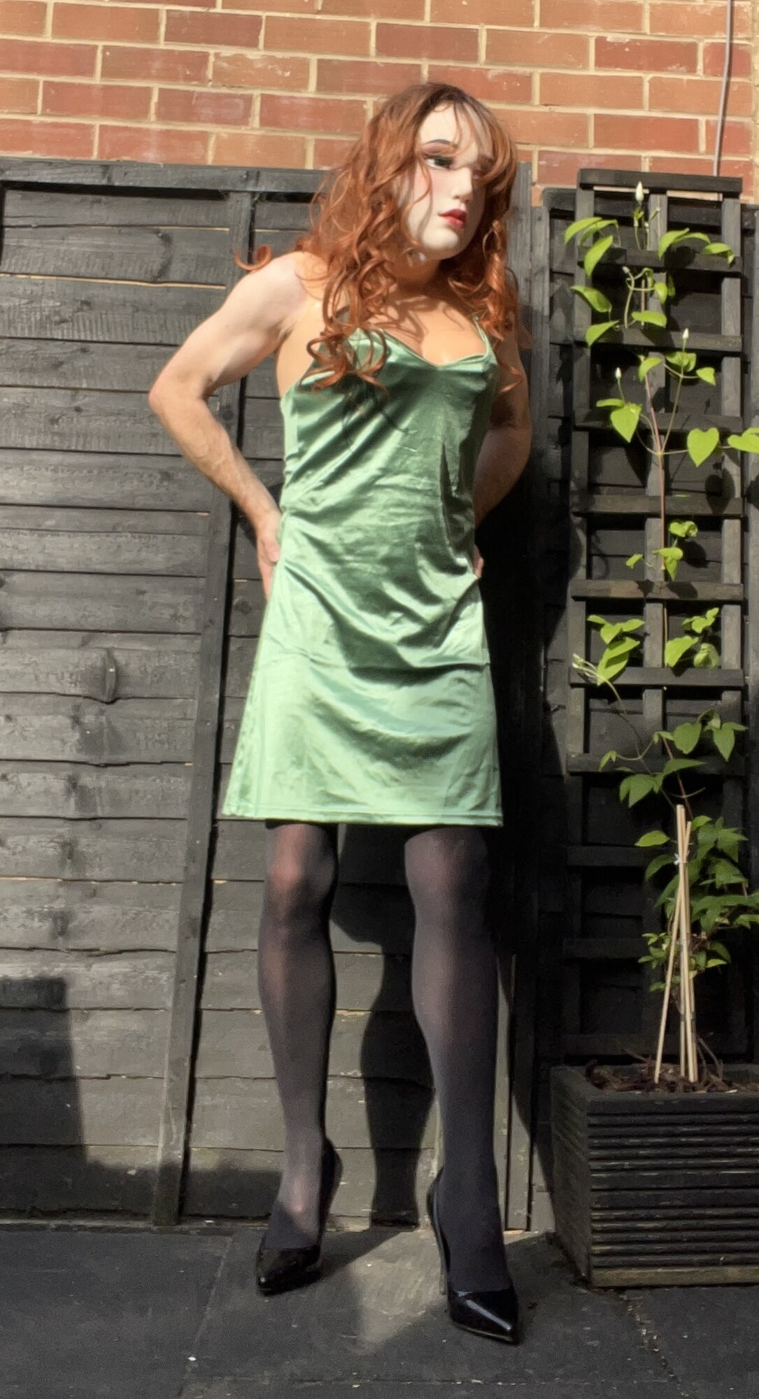 Crossdresser playing in the garden