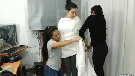 sexy girl trapped in ultra tight layered mummification         