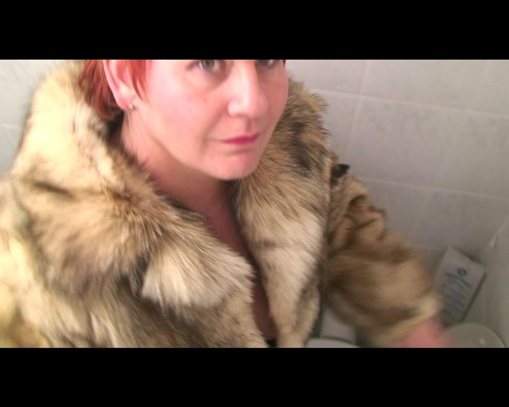 Secretly filmed in a fur coat